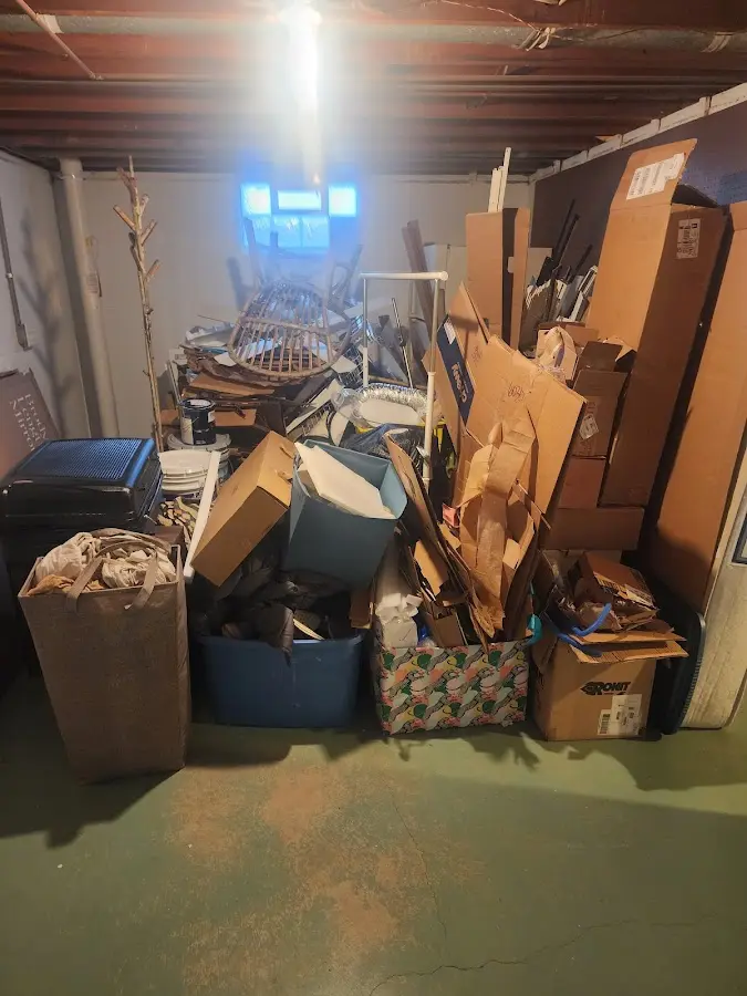 Roll-off dumpster container at job site for 2 Yard Dumpster Rental in North Potomac